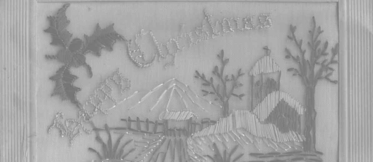 Image: embroidered holly, buildings and trees