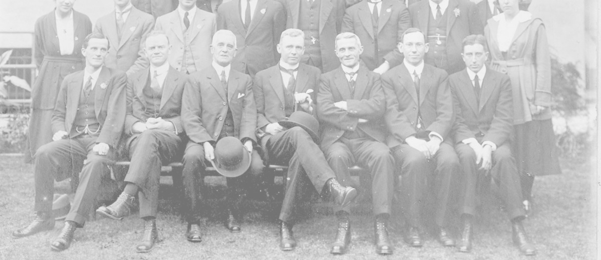 Image: men posing for group picture