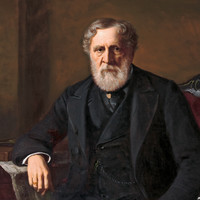 Image: an oil painting of a bearded man dressed in a black 1880s era three piece suit and seated on a plush red chair. His right elbow rests on a South Australian newspaper which is draped over a small table also bearing books and an open glass inkwell. 